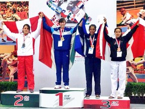 Jewelian Blackbird, right, won a bronze medal at the Pan American cadet taekwondo championships in Queretaro, Mexico. (Contributed Photo)
