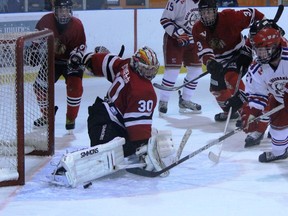 The Mitchell Hawks faced the Kincardine Bulldogs in Western Junior ‘C’ action last Friday, Sept. 20 in Kincardine. Here, Hawks’ goaltender Ben Nelson kicks out his pad to foil a scoring chance by Kincardine’s Sam Feagan. Nelson would be the difference maker in the game, stopping four rounds of Kincardine snipers in the shootout to earn the Hawks a 3-2 victory.
