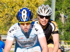 Willem Boersma (2) takes the lead over Chris Pendergast (41) during the Portage Junk Yard Dogs cyclocross A-race at Republic of Manitobah Park on Saturday. The A-race is the toughest race of the day lasting for roughly 60 minutes with only expert and elite athletes competing. (Svjetlana Mlinarevic/Portage Daily Graphic/QMI Agency)