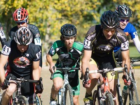 Cyclists push off during the Portage Junk Yard Dogs cyclocross A-race at Republic of Manitobah Park on Saturday. The A-race is the toughest race of the day lasting for roughly 60 minutes with only expert and elite athletes competing. (Svjetlana Mlinarevic/Portage Daily Graphic/QMI Agency)