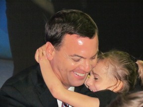 Miller Hudak gives her dad a hug at last weekend's provincial Conservative convention in London, Ont.