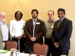 Panelists  gather (from left) Charles Beach, Penina Lam, Scott Clerk, Leslie Morley and Vikram Varma after the Community Foundation for Kingston & area Speaker Series at the Residence Inn Marriott after speaking about local immigration issues on Monday September 23 2013.  
IAN MACALPINE/KINGSTON WHIG-STANDARD/QMI AGENCY