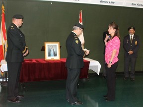 Capt. Whitebone performs the swearing-in ceremony at the armouries in Vermilion on Tuesday, Sept. 17.