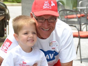 Louie Facca shares a smile with “Grandpa Bob” Facca during the latter's 500km walk from Owen Sound to London back in 2012. This spring, Facca will walk from Quebec City to the Ontario-Manitoba  in support of his grandson and children around the world who suffer from Duchenne muscular dystrophy.
Contributed Photo