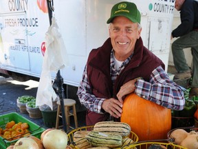 Belleville and District Chamber of Commerce executive director Bill Saunders displays a variety of fall vegetables. The city's downtown will celebrate the season on Saturday, Sept. 28 as part of the Flavours of Fall celebration.- W. BRICE MCVICAR The Intelligencer