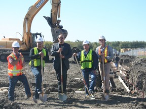 Left to right: John Altobelli, Mac Fletcher, Mayor Moe Hamdon, Joey Mouallem, Midwest Principal and Owner Andrew Hildebrand. Altobelli, Fletcher, Mouallem and Hildebrand are partners in the Horizon Travel Centre, now under construction in the south of Drayton Valley.