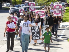 Amit Shah leads hundreds of supporters as they march through Victoria Park during a rally calling for the government to help free Londoner physician Tarek Loubani and filmmaker John Greyson from an Egyptian jail. (CRAIG GLOVER, The London Free Press)