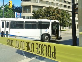 About 20 minutes after a Sarnia Transit Bus hit a pedestrian in the city's downtown, the area was taped off as several Sarnia Police Services officers spoke to witnesses and investigated the collision. HEATHER YOUNG/ SARNIA THIS WEEK/ QMI AGENCY