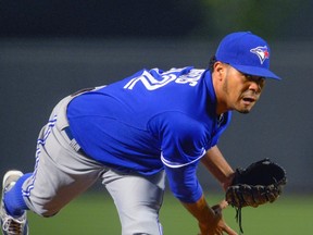 Jays starting pitcher Esmil Rogers works against the Orioles during first inning action in Baltimore on Wednesday, Sept. 25, 2013. (Doug Kapustin/Reuters)