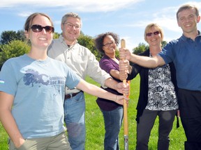 Julie Welker, Community Partnership Specialist, Upper Thames River Conservation Authority (left), David Corke, executive director, London Training Centre, Charis Parker, Glen Cairn Community Resource Centre, Michelle Palmer, Community Living London and James Coolidge, Youth for Christ London (YFC London) stand next to a shovel at Glen Cairn Park Sept. 25, 2013. Once a landfill, the park will undergo rejuvenation with the help of community partners in the area beginning Oct. 5. CHRIS MONTANINI\LONDONER\QMI AGENCY