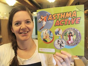 The Lung Association's Kerry McCloy holds a booklet the organization is distributing to elementary schools to better inform children about asthma.
Michael Lea The Whig-Standard