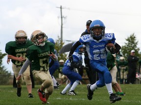 Cumberland Panthers RB Eleijah Zamor scores 1 of his 4 TDs vs the East Ottawa Generals in tyke action. (Submitted photo)