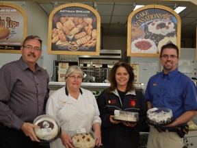 From left, Ed Berney, Diane Murray, Angela Lindberg and Rory Brady. Stony Plain Co-op donated $1,000 to Parkland Food Bank from their Cake Sensations promotion, which will become an annual donation from the Co-op. - Thomas Miller, Reporter/Examiner