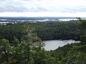 JIM MOODIE The Sudbury Star
Looking south from a minor summit on the north shore of Florence Lake, seen immediately below. The Bay of Islands, Great Cloche Island and Manitoulin occupy the background.