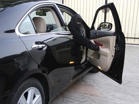 A Saudi woman looks out of her car in Jeddah June 17, 2011. REUTERS/Susan Baaghil