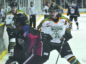 Terriers forward Dylan Butler goes to throw a hit during the Terriers game against the OCN Blizzard Sept. 29. (Kevin Hirschfield/THE GRAPHIC/QMI AGENCY).