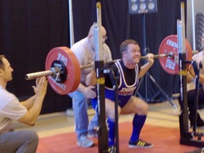 Drayton Valley powerlifter Cole Robinson recently won first place at the 100% Raw Powerlifting Western Canadian Championships, held Sept. 21 at Calgary’s Olympic park, doing a squat as seen to left, with 420 pounds, bench pressing 360 pounds and deadlifting 501 pounds. Robinson won out as best overall lifter pound-for-pound out of more than 30 competitors.