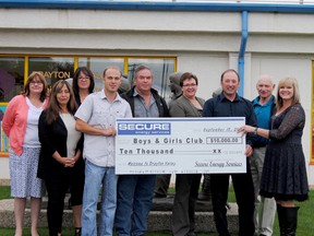 Secure Energy Inc. recently presented a cheque for $10,000 to help in the startup of a Boys and Girls Club in Drayton Valley. BACK (left to right): Dana Badke, ED of Boys and Girls Club of Wetaskiwin, Karen Hartman, community member, Bob Barker, FCSS Board. FRONT (left to right): Nancy McClure, WRPS chair, Andrew Landry and James Lorincz, facility managers with Secure, Dana Sharp-McLean, Addictions Services, Sanford Greve, sales and marketing representative for Secure Energy and Lola Strand FCSS Program Co-ordinator.