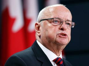 Canada's Veterans Ombudsman Guy Parent speaks during a news conference upon the release of his report in Ottawa October 1, 2013. (REUTERS/Chris Wattie)