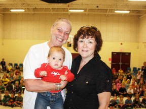 Judy Renner, granddaughter Scarlett Elliott and friend Sharon Carnochan after Renner chopped her locks for cancer.