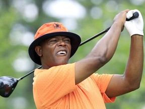 Actor Samuel L. Jackson of the U.S. watches his drive during the Mike Weir Charity Classic before the start of the Canadian Open Golf tournament at St. George's Golf and Country Club in Toronto July 19, 2010. REUTERS/Mike Cassese