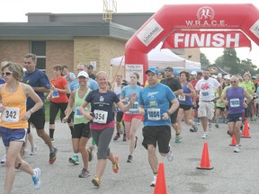 Participants in the third annual CK Harvest Run leave the starting gate.