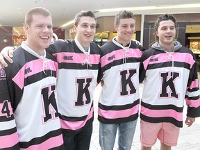 Kingston Frontenacs, from left, Mike Moffat, Matt Mahalak, Jean Dupuy and Warren Steele sport the new pink jerseys the team will be wearing for the warm-ups during their home games in October to mark Breast Cancer Awareness Month. The jerseys will be auctioned off at the end of the month to raise money for breast cancer research.
Michael Lea The Whig-Standard