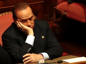 Silvio Berlusconi attends at the Senate as Italy's Prime Minister Enrico Letta's asking for a possible call for a confidence vote immediately in Rome, October 2, 2013. (Reuters)