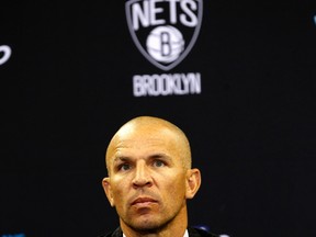 Brooklyn Nets head coach Jason Kidd listens to a question during a July 2013 news conference. (REUTERS/Adam Hunger)