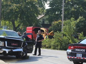 A 48-year-old Sarnia man received minor injuries after his truck collided with a tree at the intersection of Russell and Cromwell Streets Friday. Sarnia police, firefighters and paramedics were called to the scene just before 12 p.m. The struck tree came down across the road and traffic was rerouted as crews cleared the area, police say. The driver was charged with careless driving and failure to wear seatbelt. BARBARA SIMPSON / THE OBSERVER / QMI AGENCY