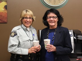 Cst. Pat Chornoby, left, and principal Darlene Marcinkevics, right. - Photo Supplied