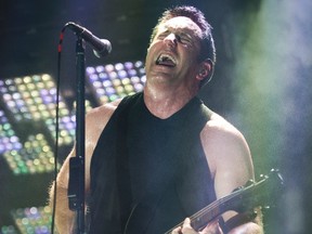 Trent Reznor of Nine Inch Nails performs at the Bell Centre in Montreal Oct. 3, 2013. (QMI Agency)