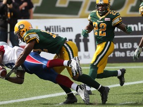 Montreal Alouettes slotback S.J. Green (left) scores a touchdown during the first half of the game at Commonwealth Stadium in Edmonton, Alta., on Saturday, Oct. 5, 2013. Ian Kucerak/Edmonton Sun/QMI Agency