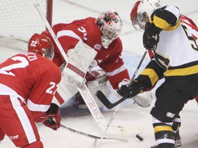 Kingston defenceman Matthew Watson tries to get to a rebound on  Soo Greyhounds goaltender Matt Murray during the second period of Sunday's game. Kingston won 3-2. (Elliot Ferguson The Whig-Standard)