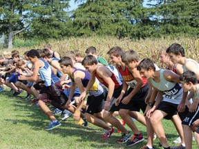 Junior Boys team on starting line from left to right are Tanner Stevenson, Chris Enders, Michael Schraa, Wes Klages.