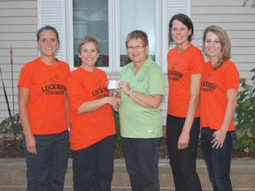 The Lucknow Little Mudder committee recently met with members of the Lucknow Agricultural Society this past week to present a cheque for over $4000 to the Ag Society. The money will go towards the 2014 Fall Fair. From left to right are (L-R) LeeAnn Maki, Amanda Moffat, Lucknow Ag Society member Liz Irvin, Jackie Fischer, and Kaylan Hicks. Absent are Cathy Gibson and Hadyn Sanchez. The Little Mudder had a great turnout with 117 registered (120 spots were available!) and all the rain only made for a muddier Mudder.