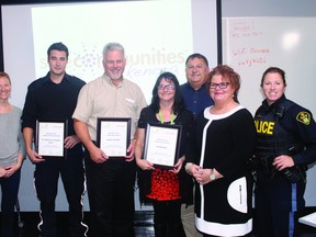 Alan S. Hale/Daily Miner and News 
Winners of the Ambassador Safety Awards along with members of the Safe Communities Kenora executive (left to right): Jen Carlson, Safe Communities Kenora co-chairman; Kenton Ammerman, accepting on behalf of Kenora Fire and Emergency Services Department; Dave Allen, Copperfin Credit Union; Judy Underwood, outgoing co-chairman, Mark Balcaen, treasurer; Maria Bagdonas, co-chairman; Ronnie Grosenick, member at large.