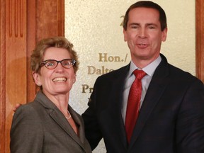 Then-premier Dalton McGuinty meets with incoming Premier Kathleen Wynne at Queen's Park in Toronto after her selection to lead the provincial Liberals. 
QMI Agency