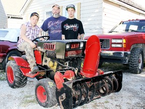 Jerry Blake, middle, and his sons, Jake, 16, left, and Duke, 18, are looking forward to the Wallaceburg Red Neck Santa Claus Parade being held Nov. 16, which will include a parade of riding lawnmowers decorated in a red neck theme. The goal is to attract 1,000 riding lawnmowers to break a Guinness world record.  Ellwood Shreve/Chatham Daily News