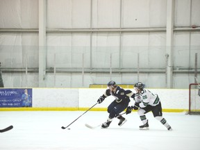 Brandon Hickey, No. 5, in action at last week’s AJHL Showcase, has attracted the attention of NHL draft scouts. - Thomas Miller, Reporter/Examiner