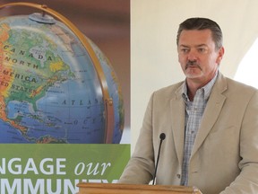 Doug Horner speaks at the Spruce Grove school sign unveiling on Oct. 4. - Karen Haynes, Reporter/Examiner