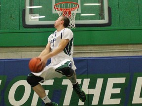 Lambton Lions forward Mike Lucier throws down a behind the back dunk during practice. Lucier is one of the five players that will be looked to carry the Lions to the OCAA playoffs this year. SUBMITTED PHOTO