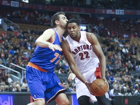 Rudy Gay of the Raptors gets up close and personal with Andrea Bargnani of the New York Knicks at the ACC last night. Toronto mounted a late comeback to earn a 100-91 victory. (Veronica Henri/Toronto Sun)