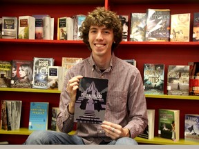 Christopher Compton, 21, spoke to Northern Collegiate's book club about his recently published fiction fantasy novel Eternal Dreams. MELANIE ANDERSON/THE OBSERVER/QMI AGENCY
