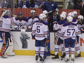 Dallas Eakins and the Edmonton Oilers dropped a 6-5 overtime decision to the Maple Leafs on Saturday in Toronto. (JACK BOLAND/TORONTO SUN)