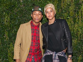 Pharrell Williams and Helen Lasichanh. (Daniel Tanner/WENN.com)