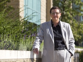 Susan Grindrod, associate vice-president of housing and ancillary services for Western University, stands outside of Elgin Hall. CRAIG GLOVER The London Free Press / QMI AGENCY