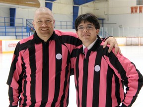 Mark Colbran (left) and Matthew Murray have spearheaded an initiative within the Bluewater Referees Association to donate wages from hockey games on Oct. 20 to the Sarnia-Lambton Breast Cancer Association. They are pictured here wearing the uniforms they will don for a game between the Lambton Jr. Sting Major Midgets and the Windsor Spitfire Major Midgets. SHAUN BISSON/ THE OBSERVER/ QMI AGENCY