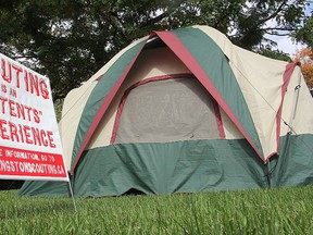 A tent and sign set up on Loyalist area scouting commissioner David Cunningham's front lawn is designed to draw people's attention to the movement and hopefully bring in some new beavers, cubs or scouts.
Michael Lea The Whig-Standard