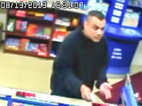 Toronto Police are appealing for the public's help in identifying a man who robbed a convenience store in Mimico at gunpoint Aug. 13, 2013. PHOTO SUPPLIED BY TORONTO POLICE